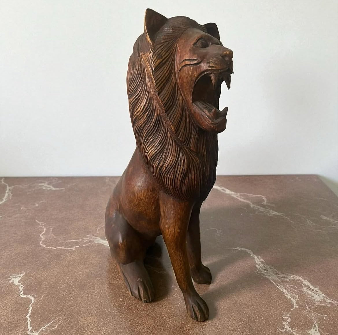 Indonesian Wooden Sitting Lion Sculpture