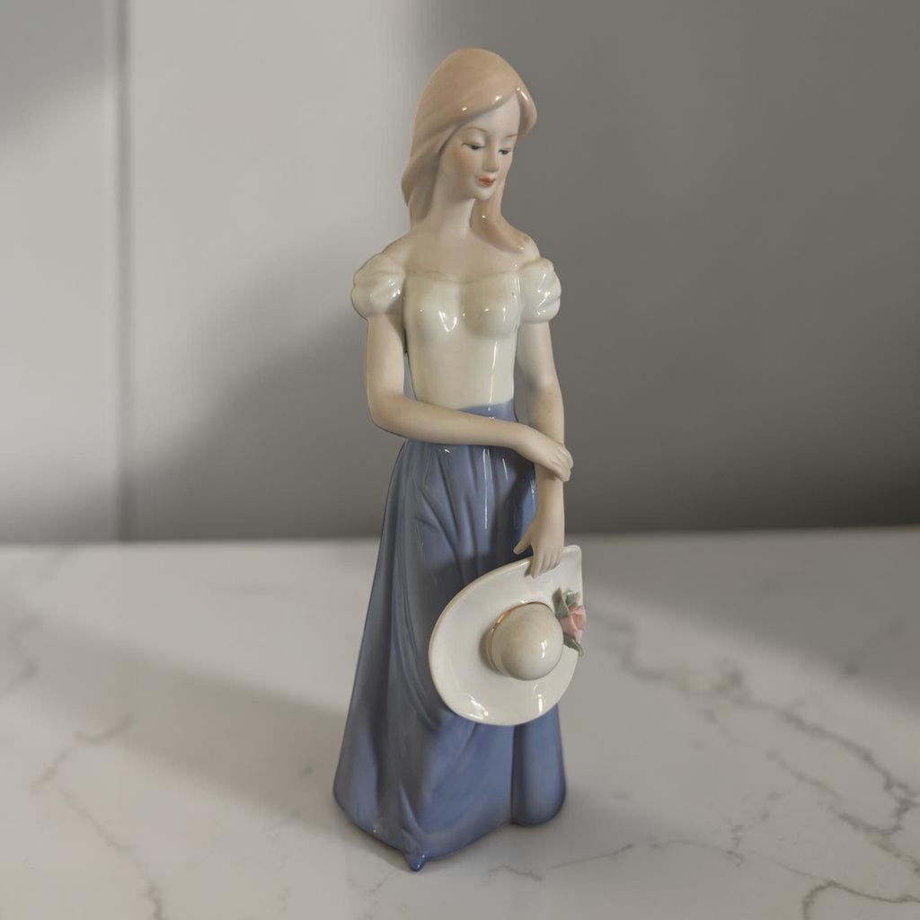 European Porcelain Figurine – Lady with Bonnet – Blue & White Dress