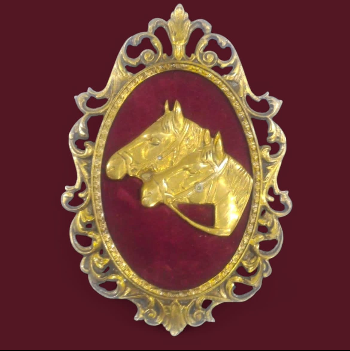 Brass Horse Relief Frame: Velvet Backdrop & Ornate Detail