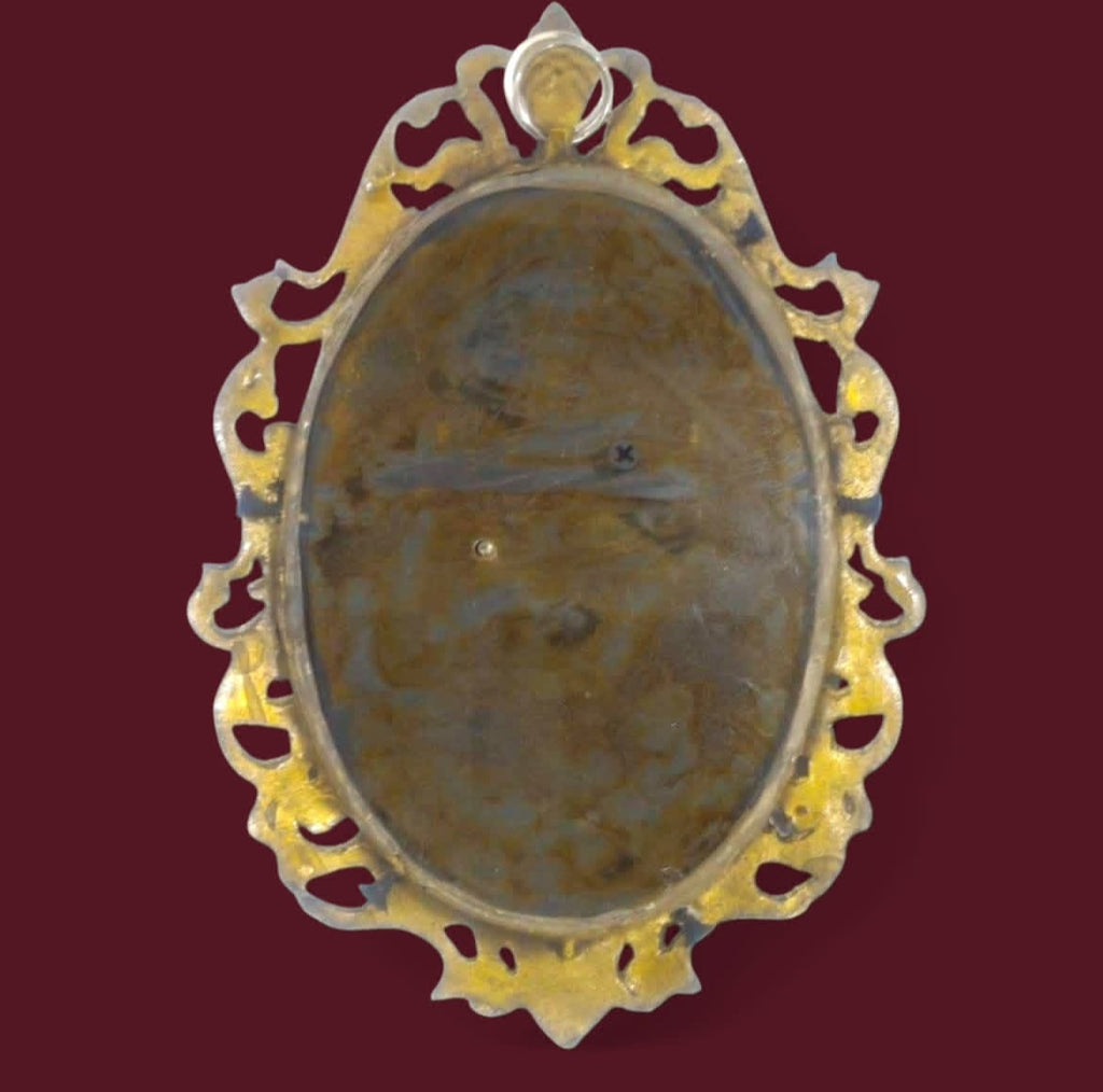 Brass Horse Relief Frame: Velvet Backdrop & Ornate Detail