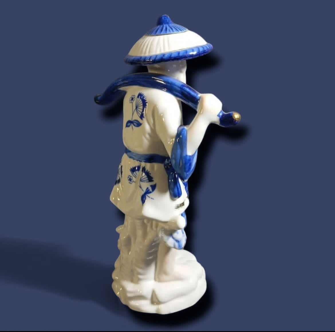 Japanese Porcelain Fisherman: Hand-Painted Classic Figurine